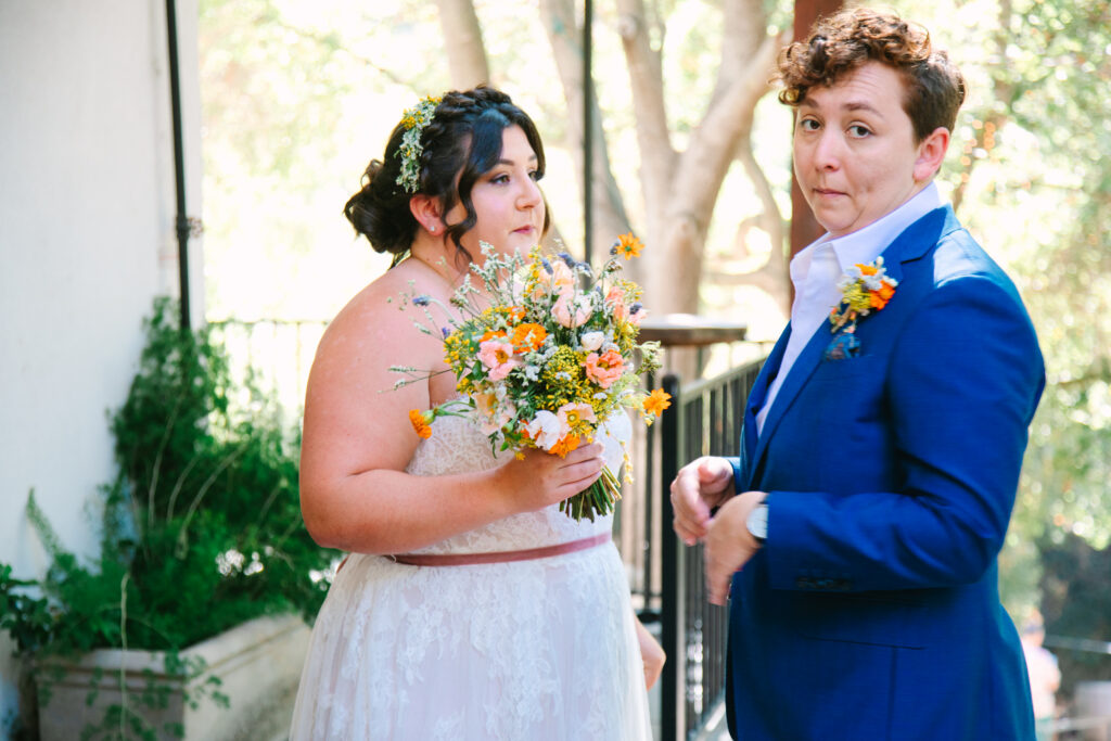 1909 Wedding, bride in a blue suit and bride in a white dress, first look