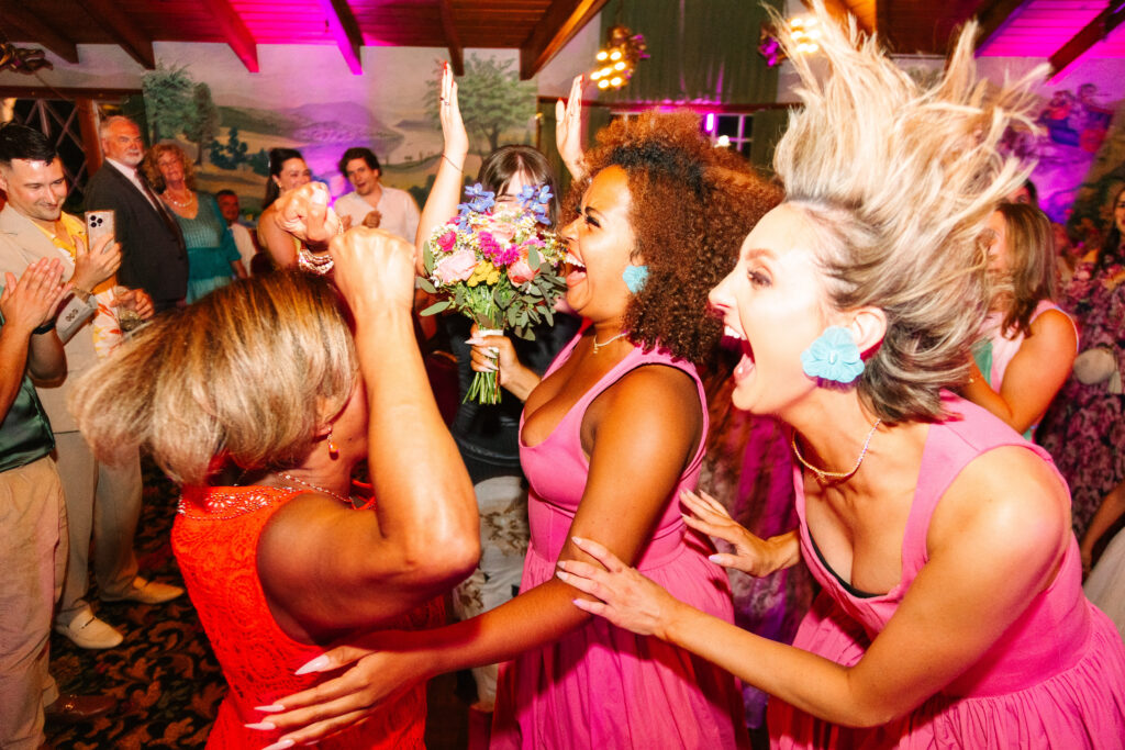 Madonna Inn Wedding Bride bouquet toss during the reception